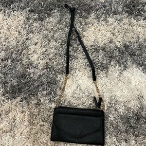 Small black clutch purse with chain